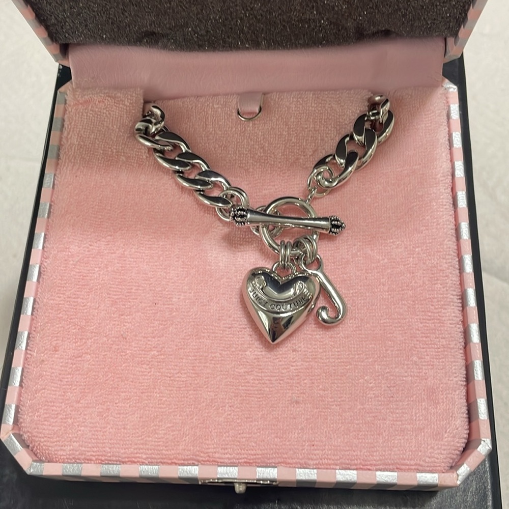 Juicy couture silver chain necklace with heart pendant.